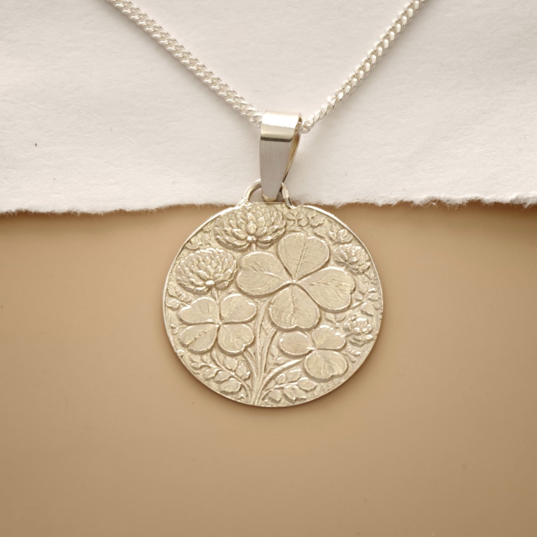 sterling silver four leaf clover necklace good luck charm engraved designed in the UK