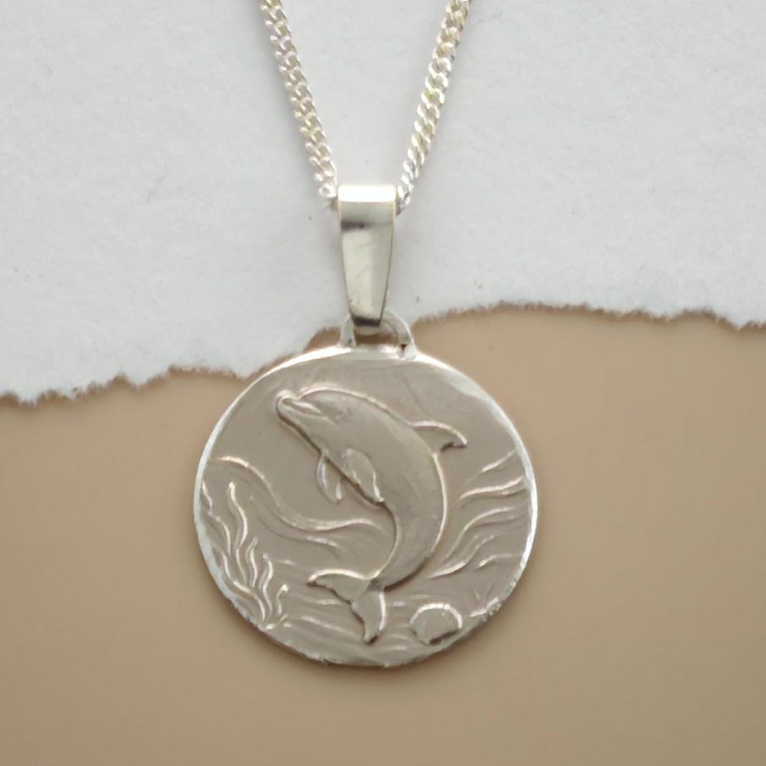 Dolphin Engraved Sterling Silver Coin Necklace