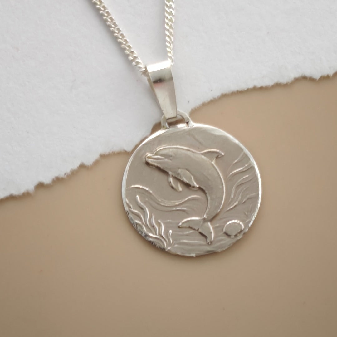 Dolphin Engraved Sterling Silver Coin Necklace