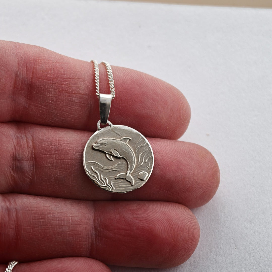 Dolphin Engraved Sterling Silver Coin Necklace