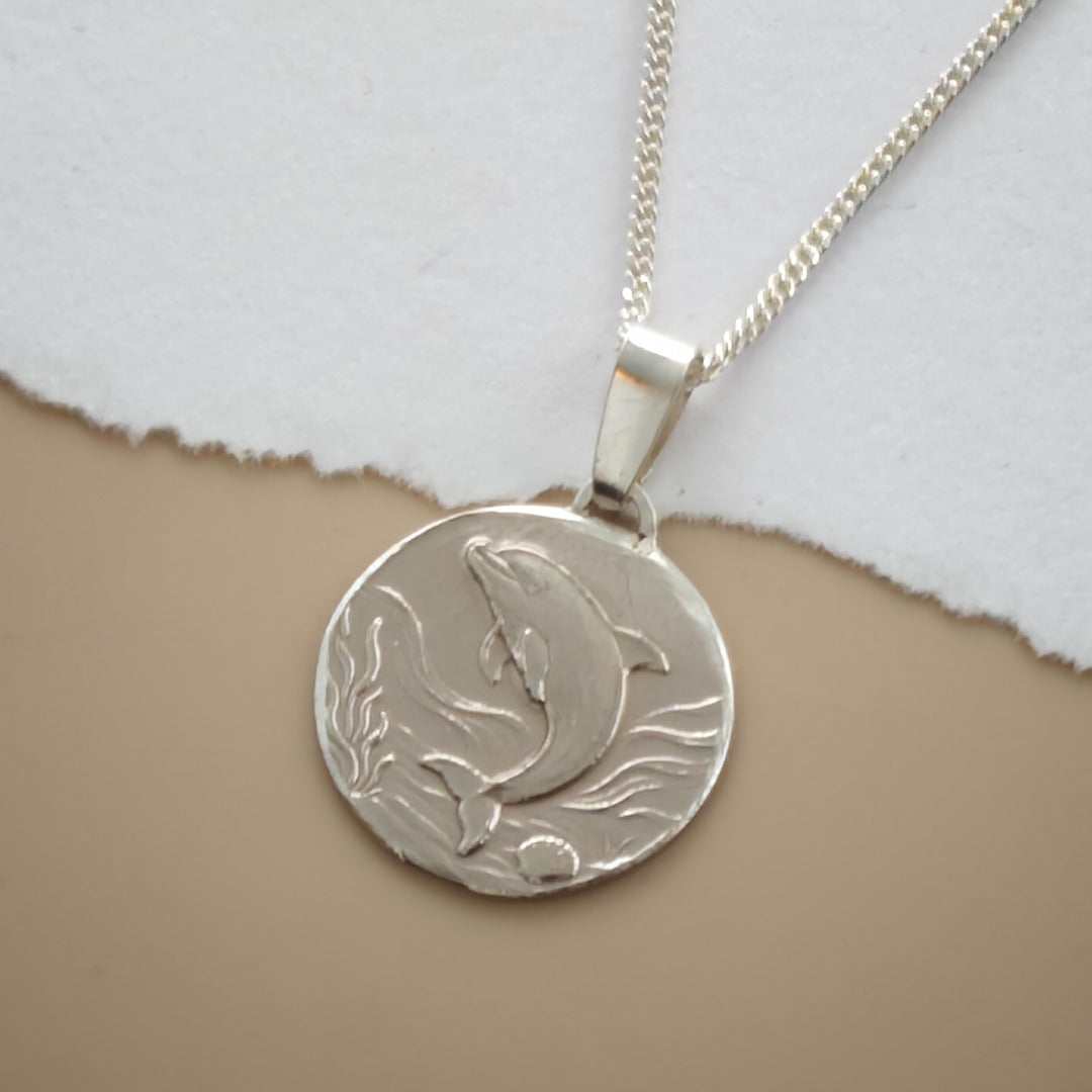 Dolphin Engraved Sterling Silver Coin Necklace