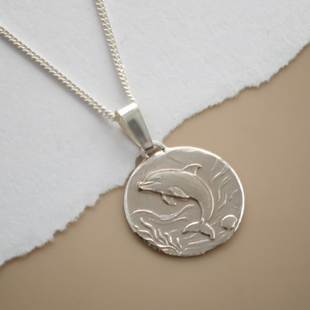Dolphin Engraved Sterling Silver Coin Necklace