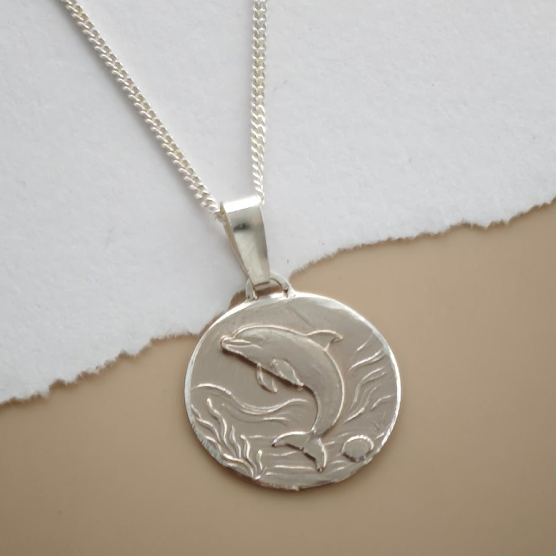Dolphin Engraved Sterling Silver Coin Necklace