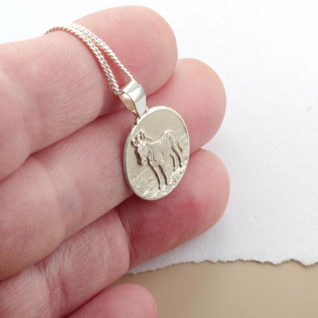 Zebra Engraved Sterling Silver Coin Necklace