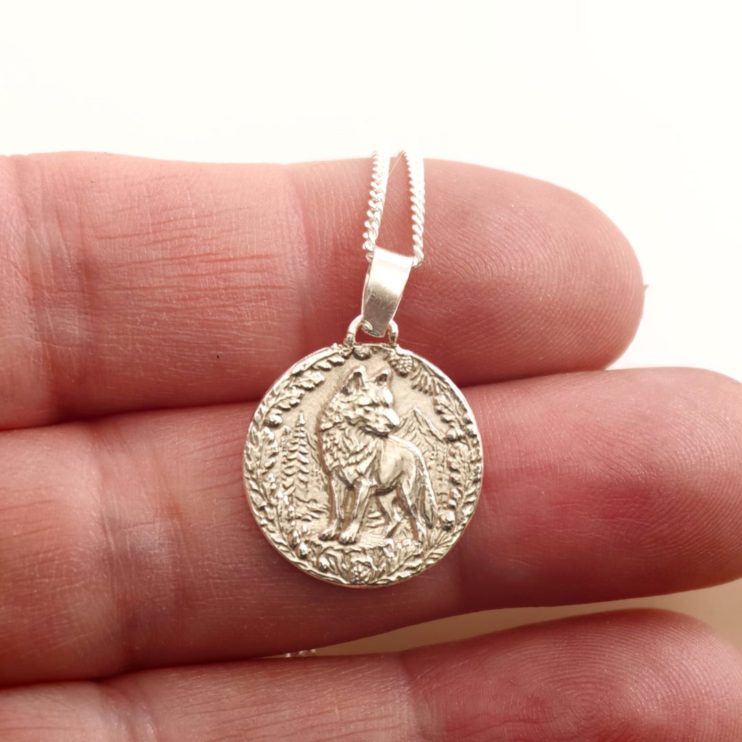 Wolf Engraved Sterling Silver Coin Necklace