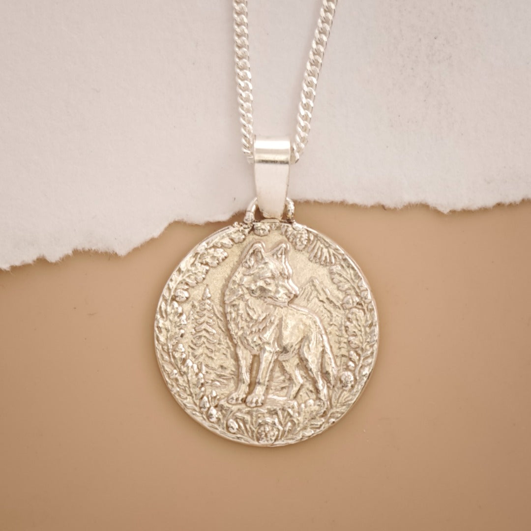 Wolf Engraved Sterling Silver Coin Necklace