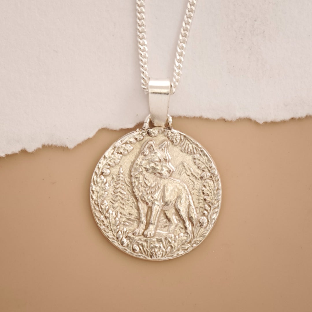 Wolf Engraved Sterling Silver Coin Necklace