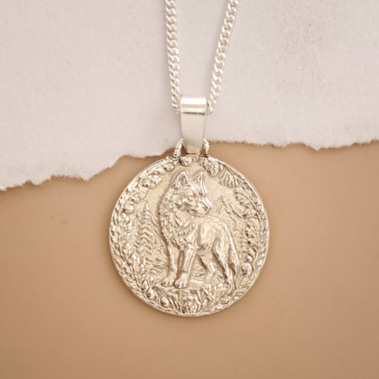 Wolf Engraved Sterling Silver Coin Necklace