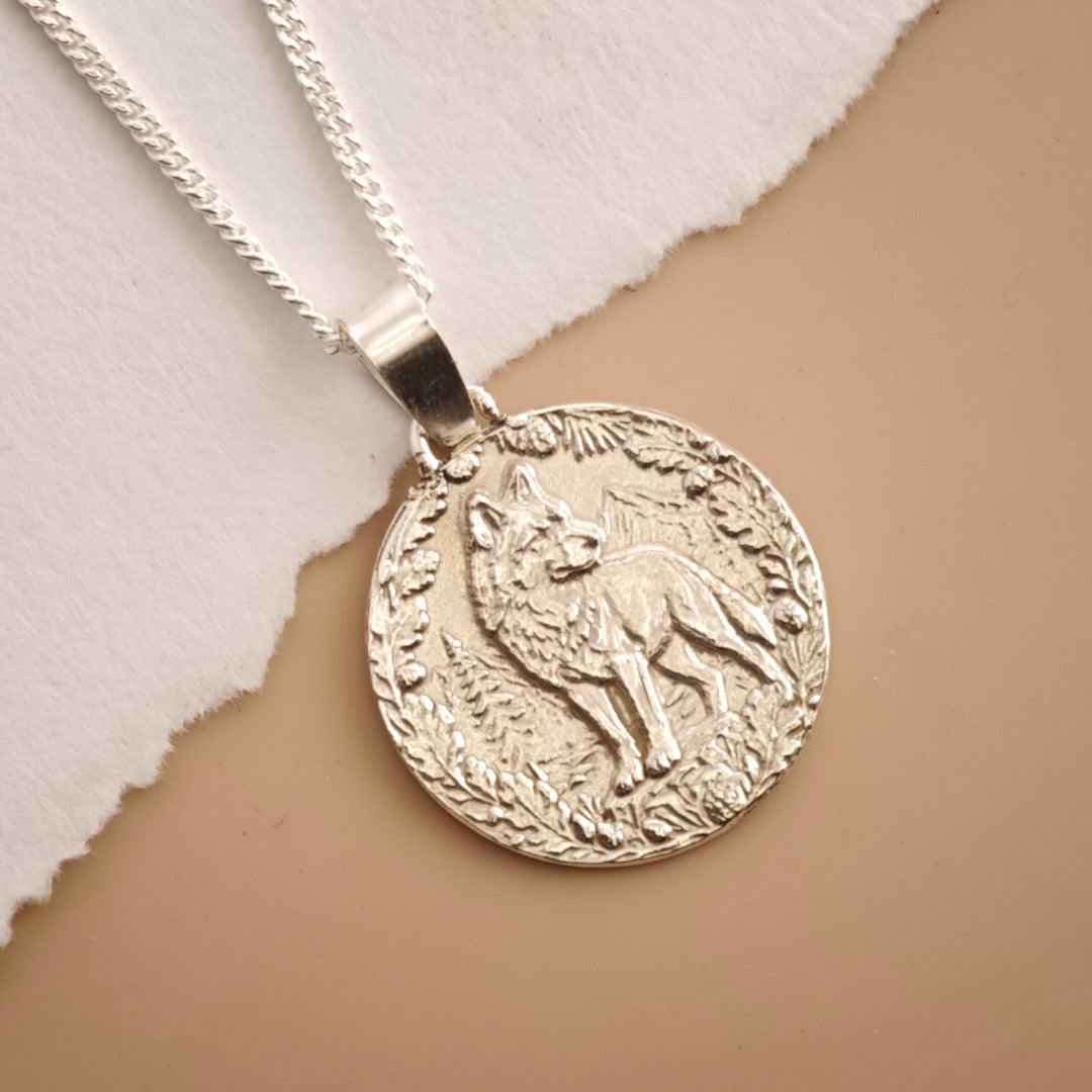 Wolf Engraved Sterling Silver Coin Necklace