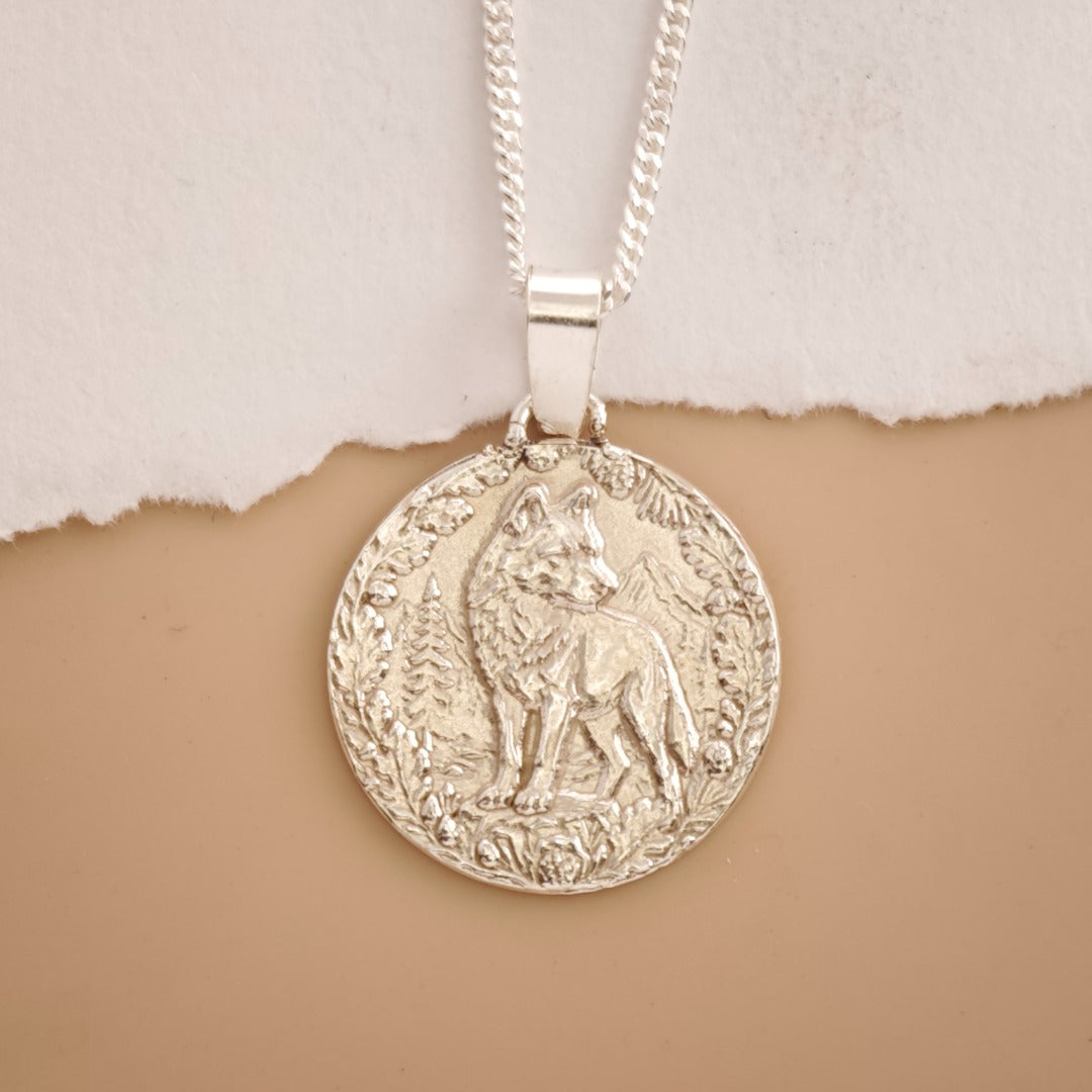 Wolf Engraved Sterling Silver Coin Necklace