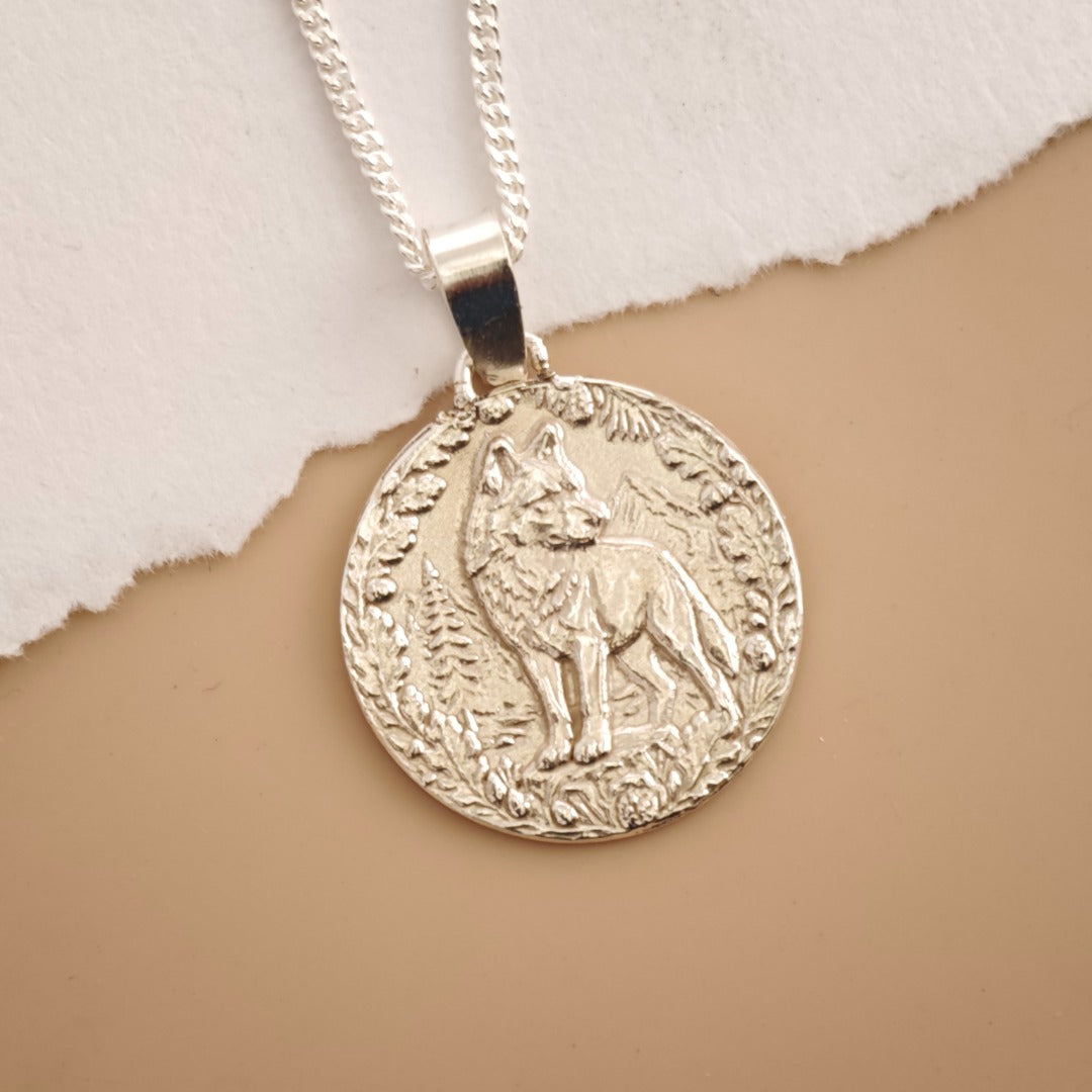 Wolf Engraved Sterling Silver Coin Necklace