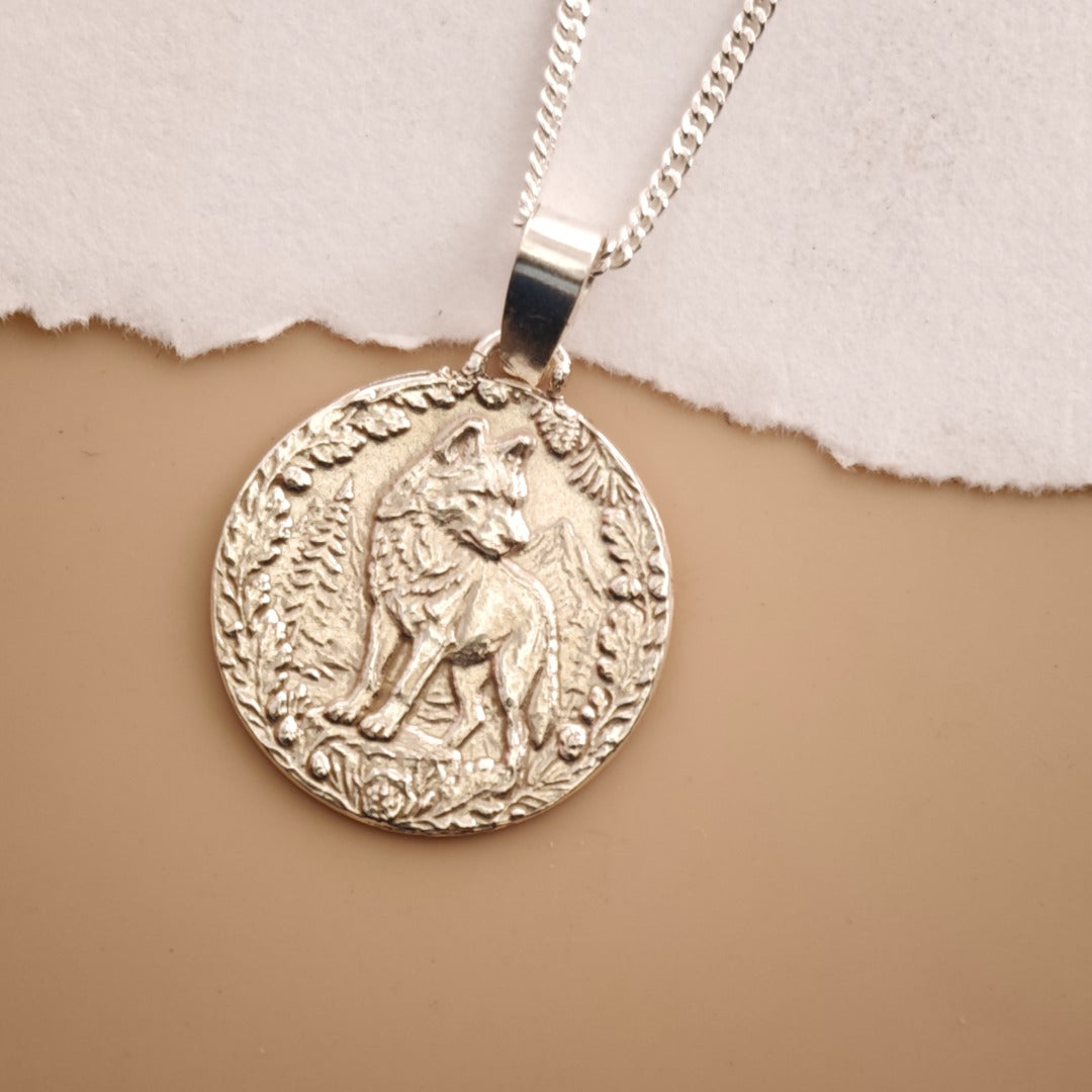 Wolf Engraved Sterling Silver Coin Necklace