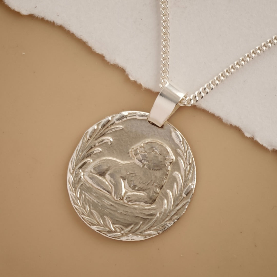 Otter Engraved Sterling Silver Coin Necklace