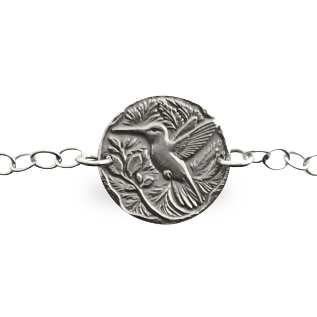 Hummingbird engraved sterling silver coin bracelet by Ojewellery