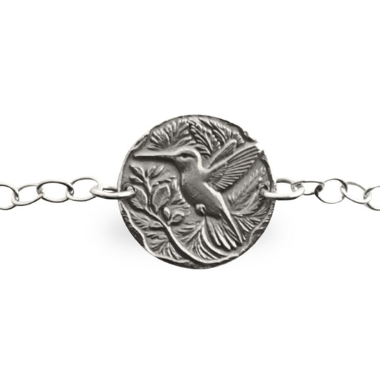 Hummingbird engraved sterling silver coin bracelet by Ojewellery