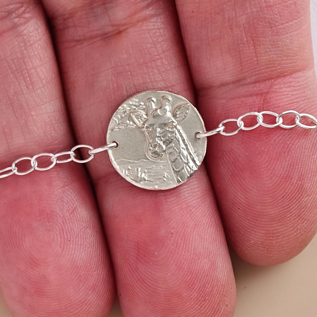 Giraffe coin bracelet - engraving detail