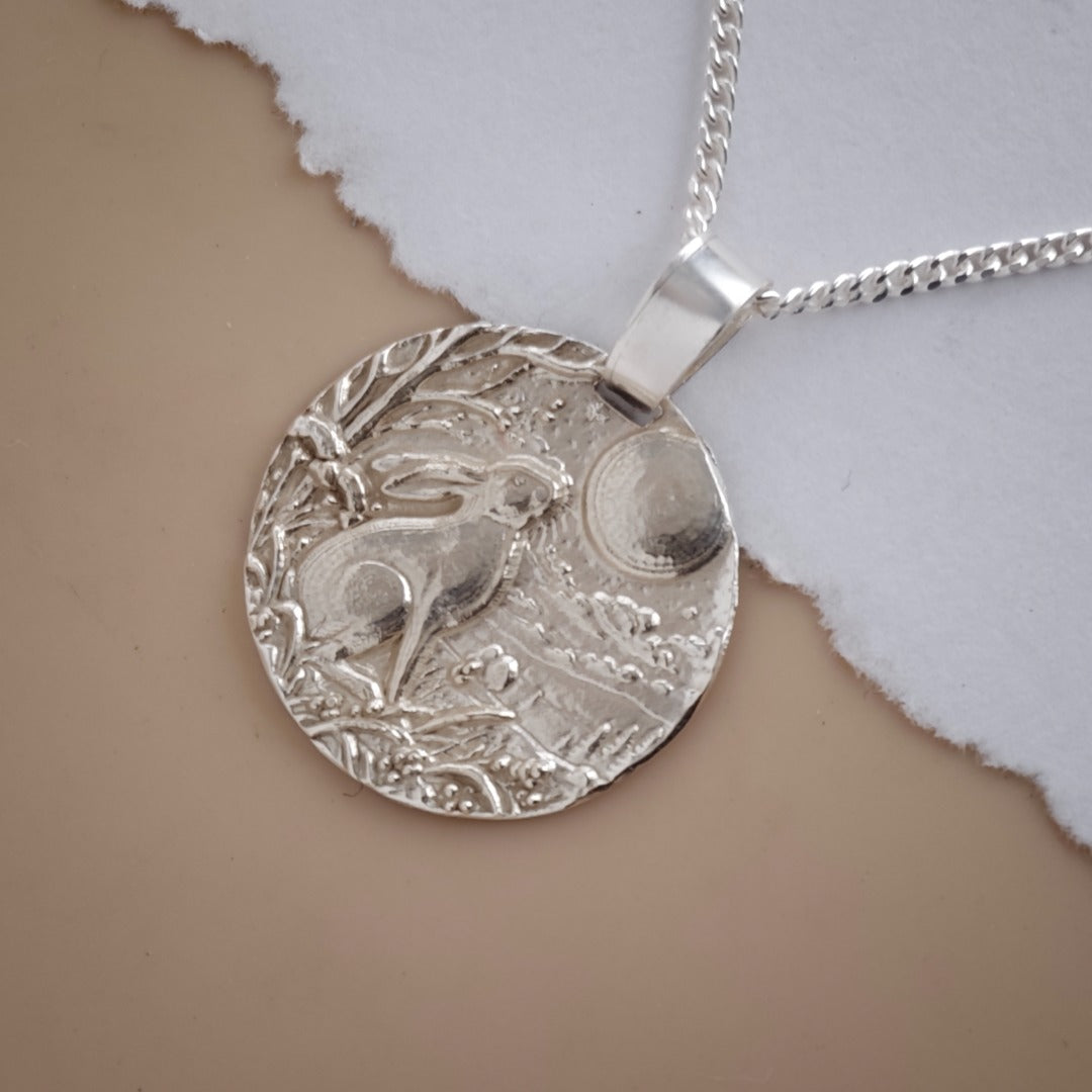 Moongazing hare engraved coin pendant necklace in recycled sterling silver, Ojewellery Christmas jewellery