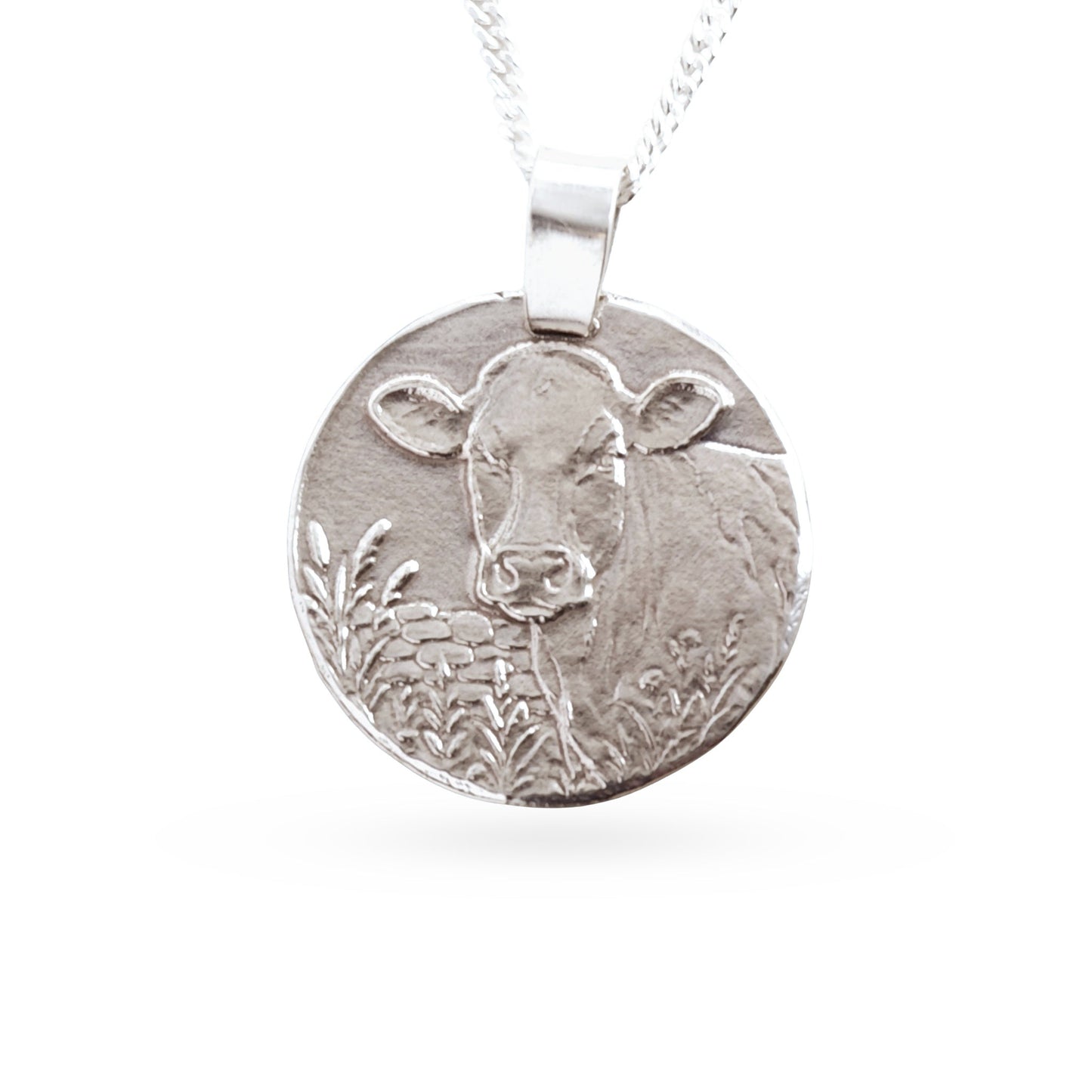 Sterling silver engraved cow coin pendant necklace, handcrafted in the UK from recycled sterling silver