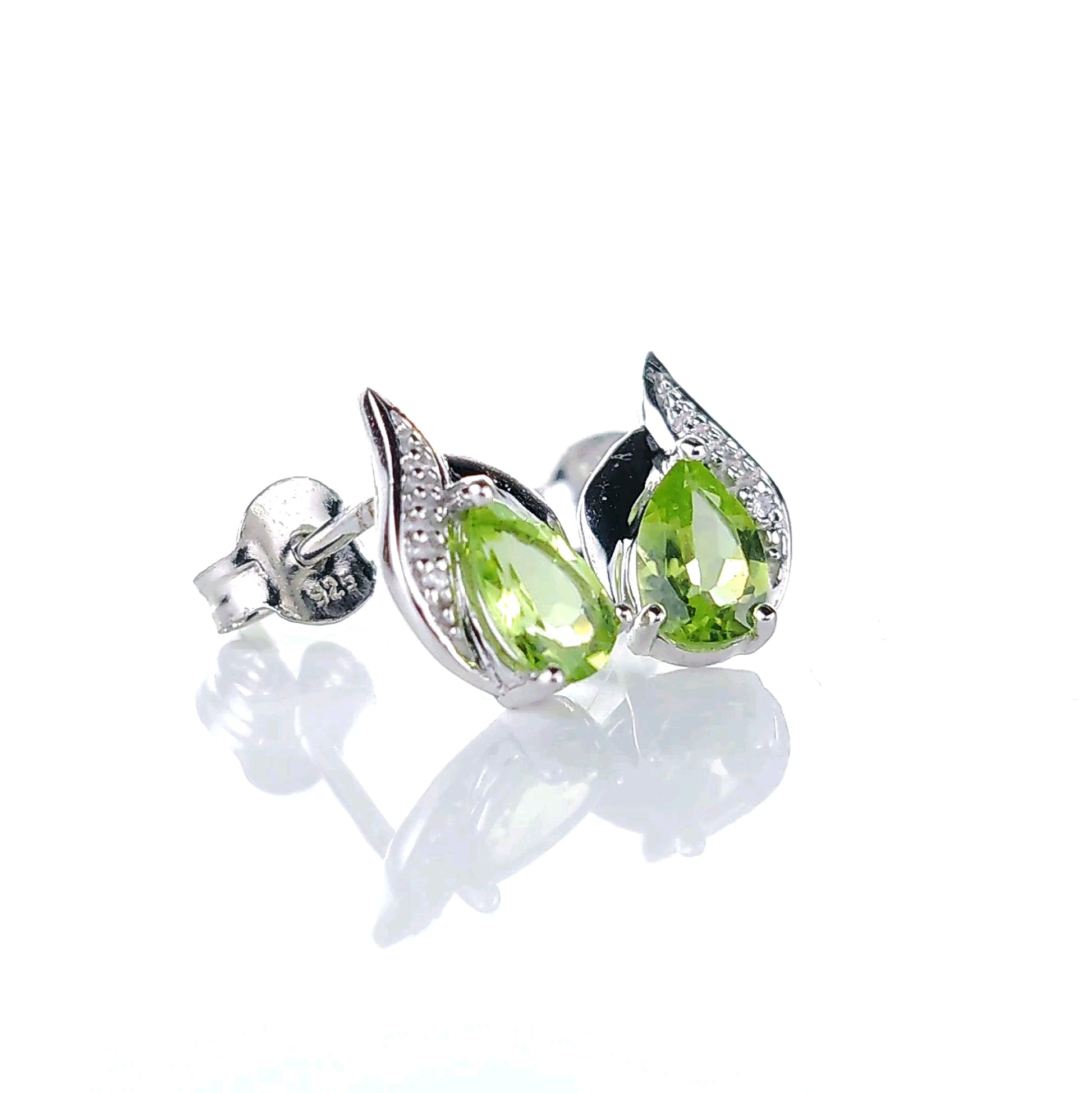 Peridot and tiny diamond stud earrings