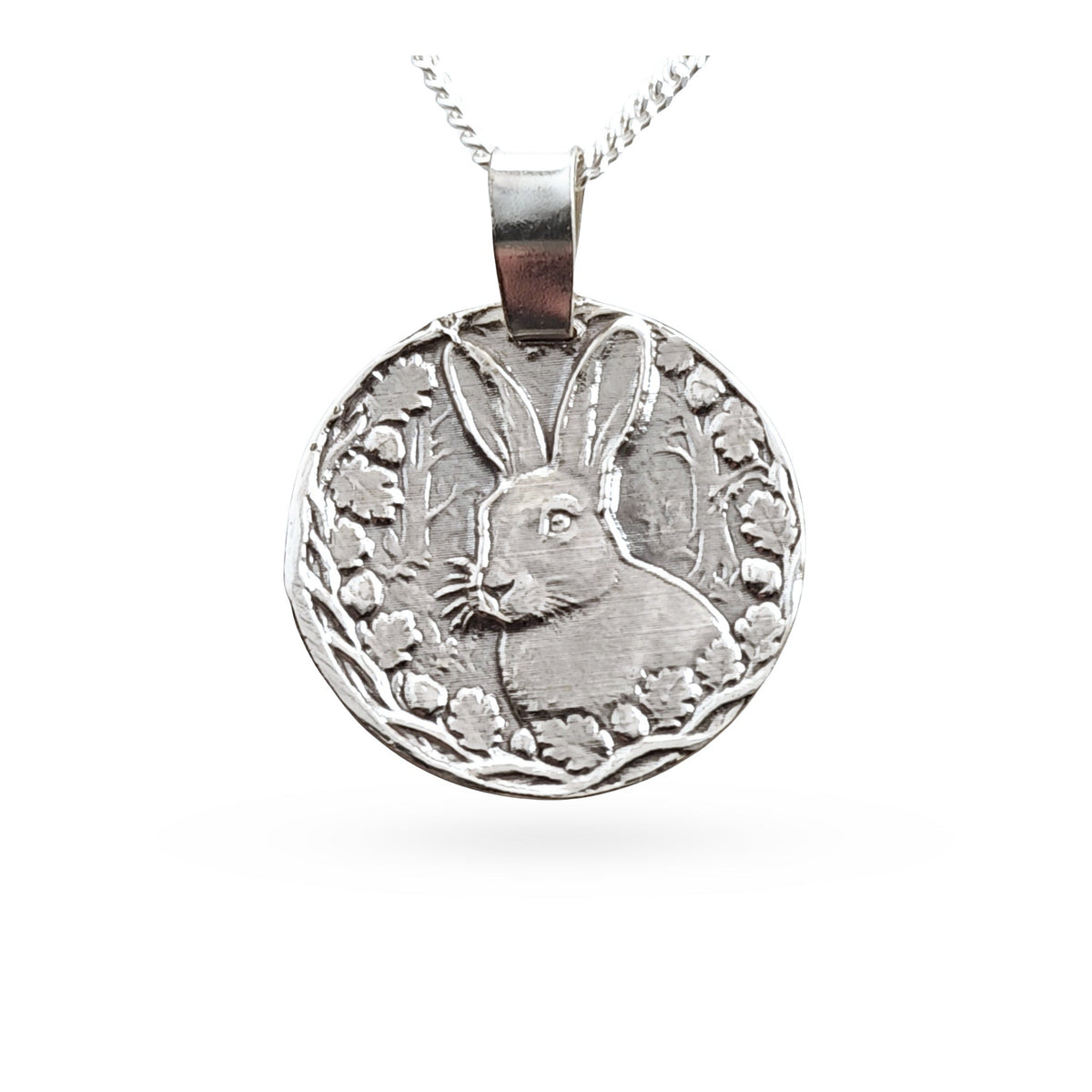 Sterling silver engraved hare coin pendant necklace, handcrafted in the UK from recycled sterling silver