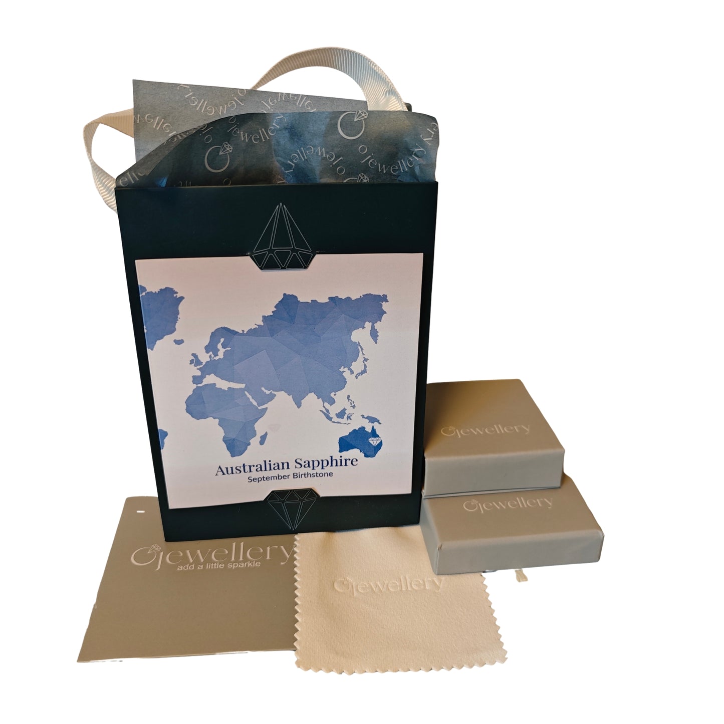 Jewelry packaging set with map design showing the location of Australia where the sapphire are mined and the words Australian Sappphire September Birthstone, jewelry box, and cleaning cloth on a white background