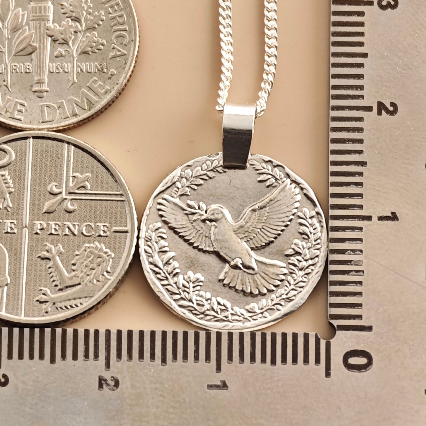 Dove Engraved Sterling Silver Coin Necklace