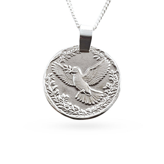 Sterling silver engraved dove coin pendant necklace, handcrafted in the UK from recycled sterling silver