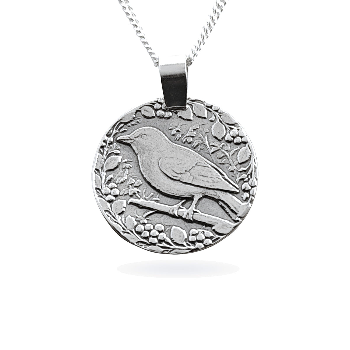 Sterling silver engraved songbird coin pendant necklace, handcrafted in the UK from recycled sterling silver