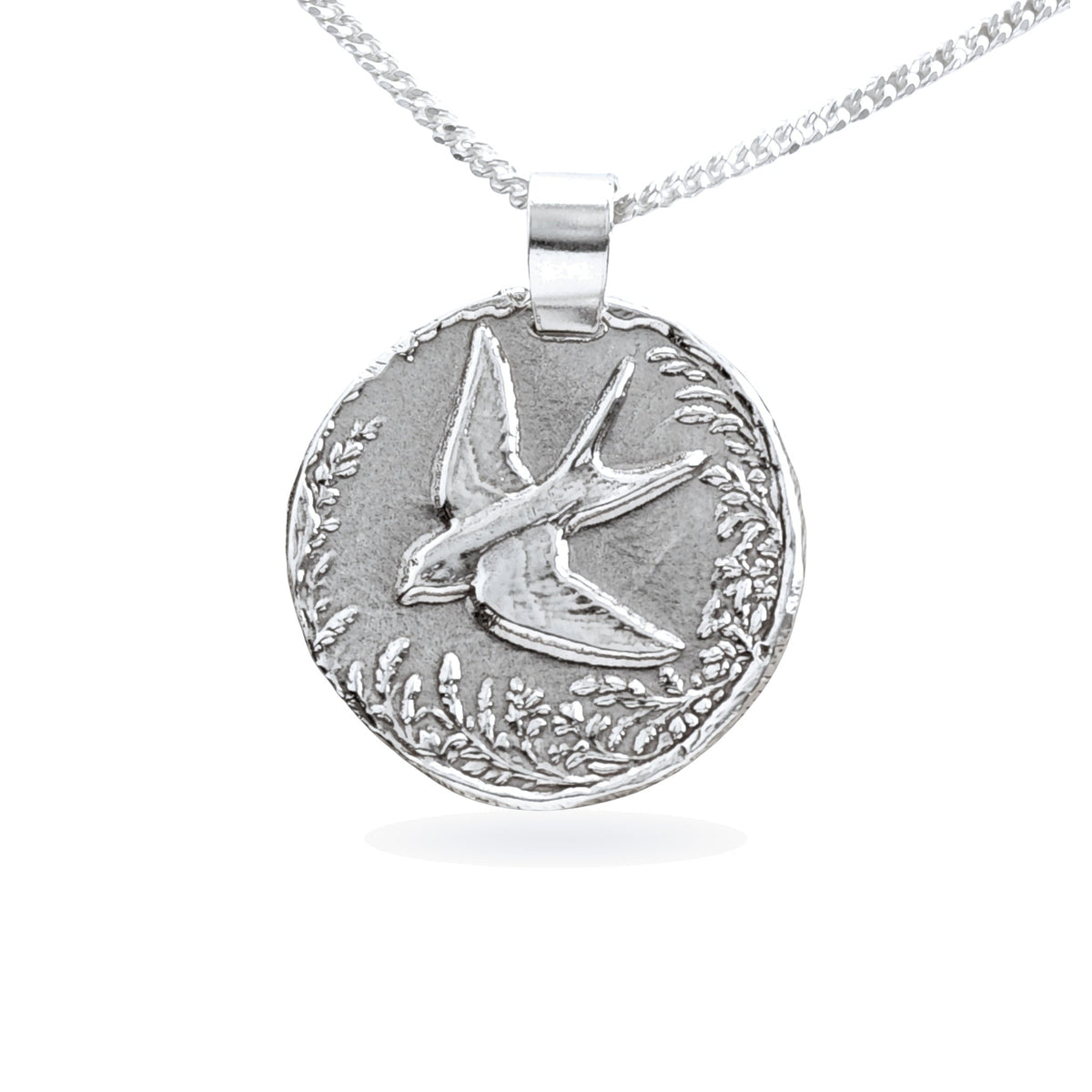 Sterling silver engraved swallow coin pendant necklace, handcrafted in the UK from recycled sterling silver