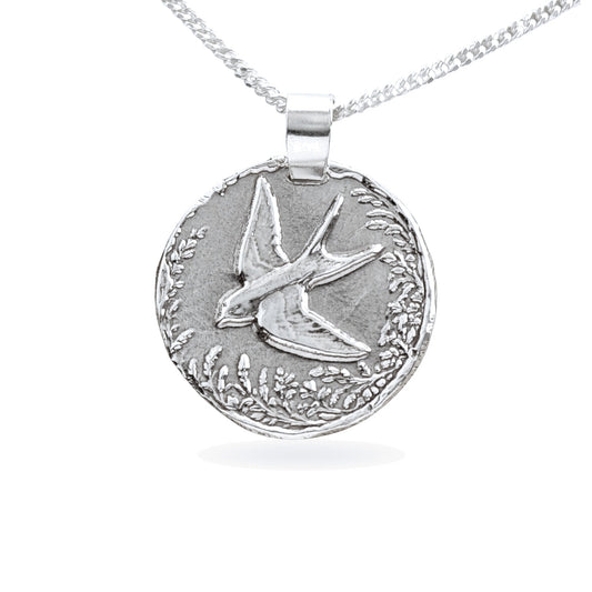 Sterling silver engraved swallow coin pendant necklace, handcrafted in the UK from recycled sterling silver