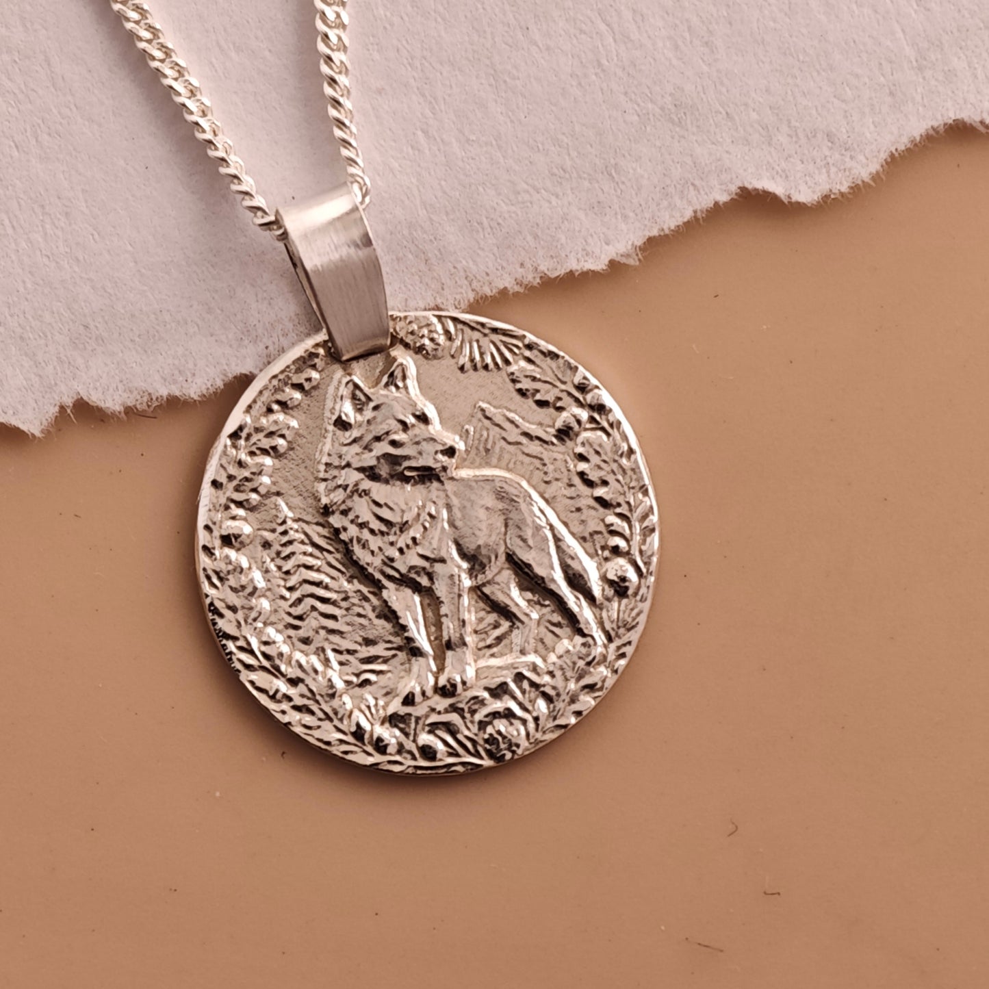 Wolf Engraved Sterling Silver Coin Necklace