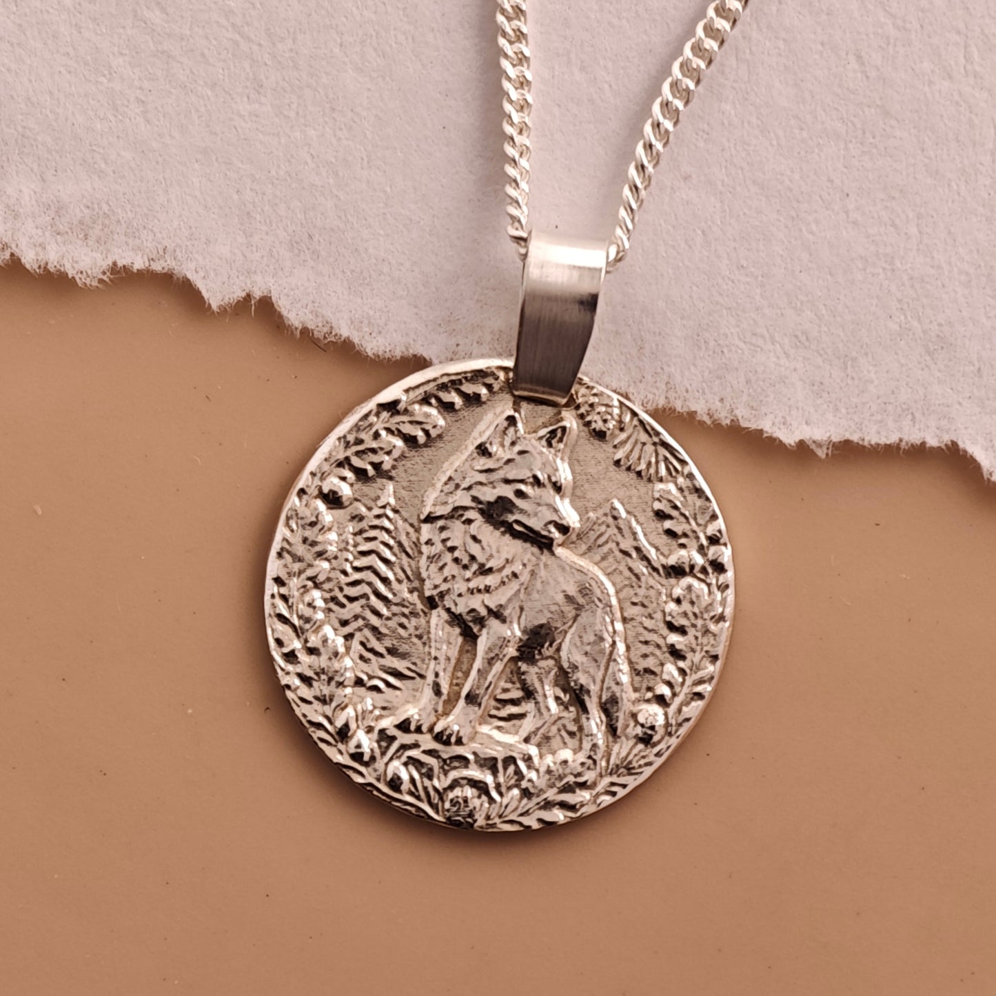 Wolf Engraved Sterling Silver Coin Necklace