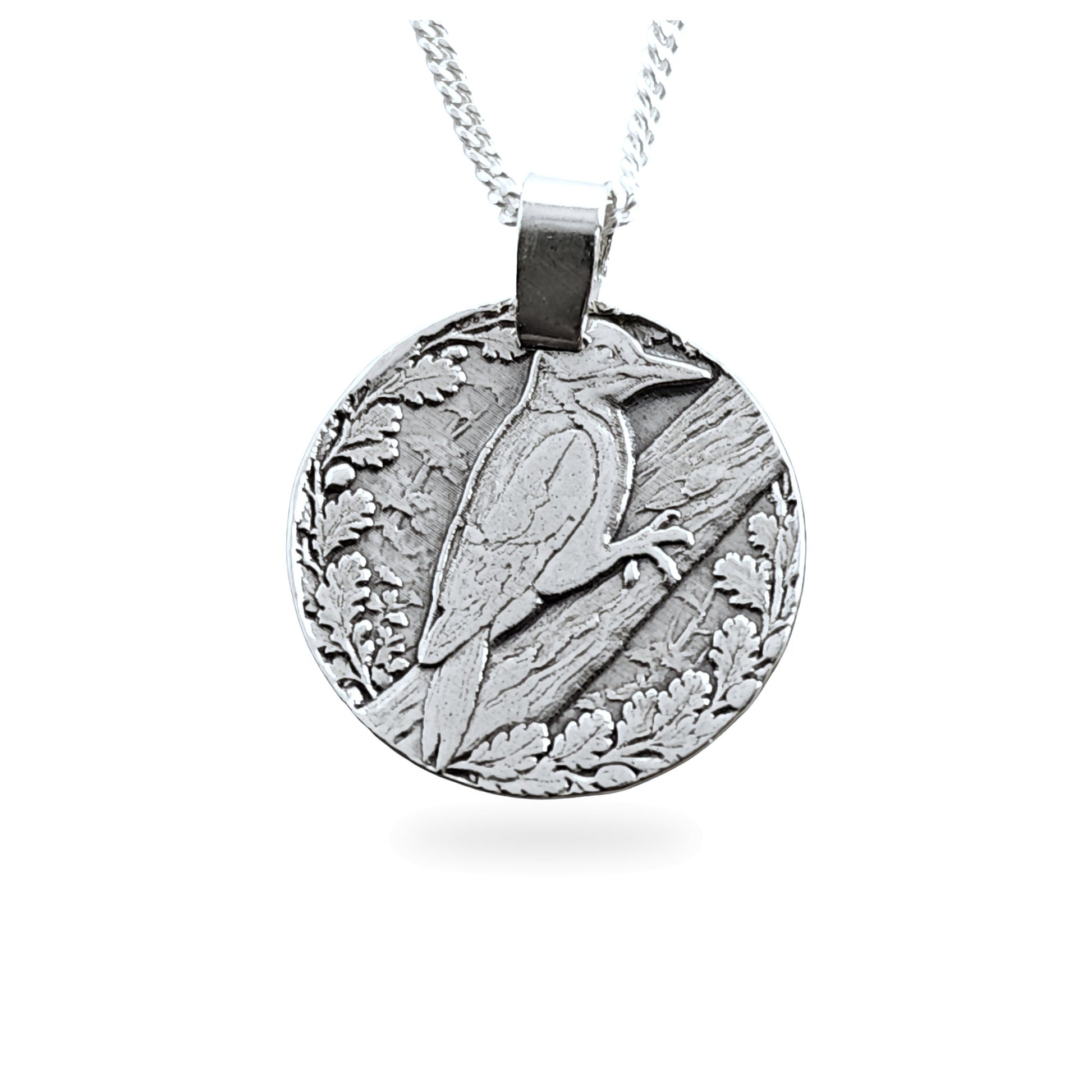 Sterling silver engraved woodpecker coin pendant necklace, handcrafted in the UK from recycled sterling silver