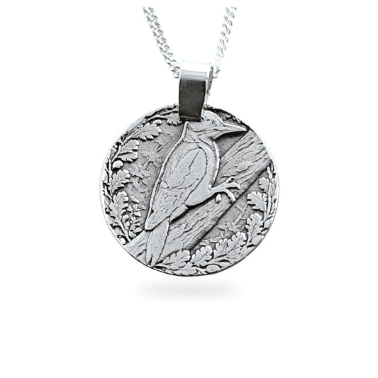 Sterling silver engraved woodpecker coin pendant necklace, handcrafted in the UK from recycled sterling silver