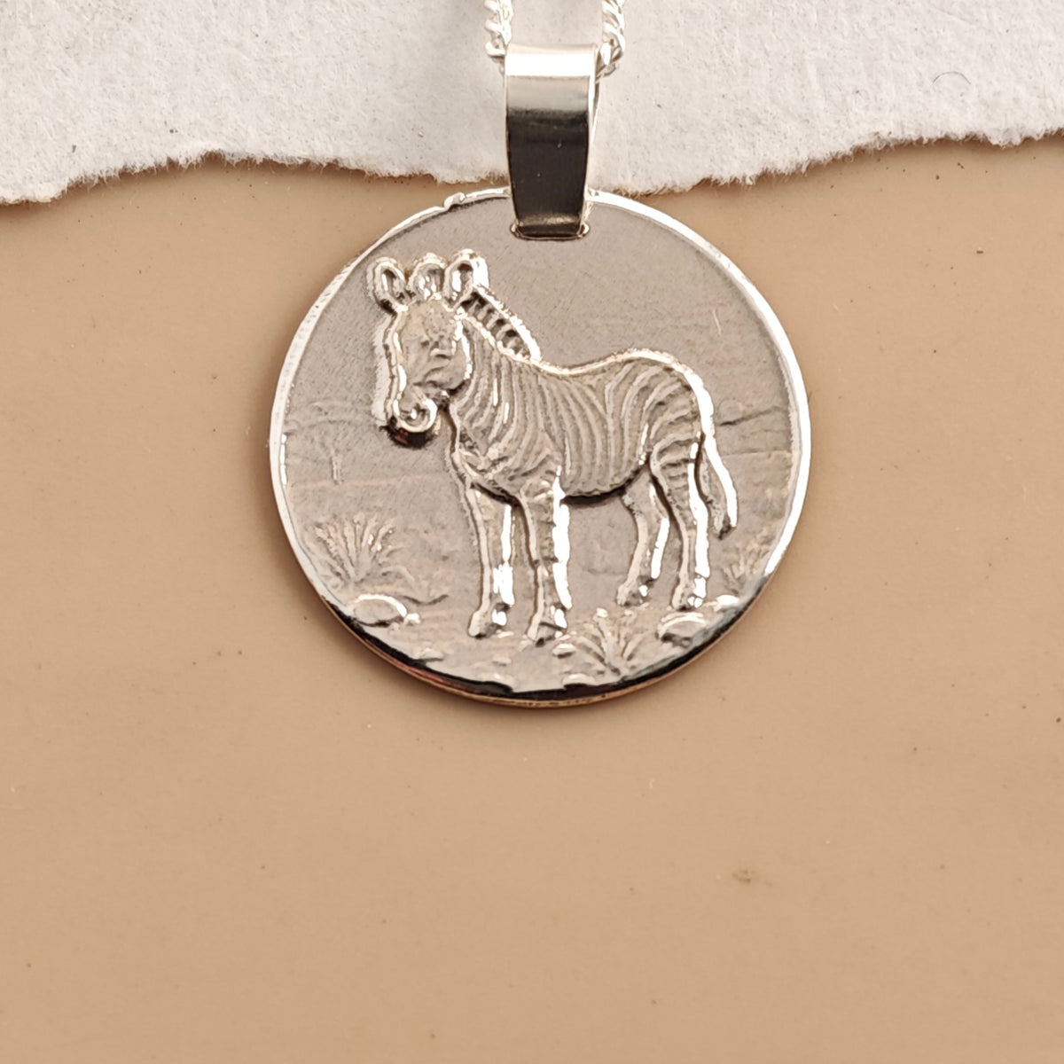 Zebra Coin Necklace – Deep Engraved Recycled Sterling Silver