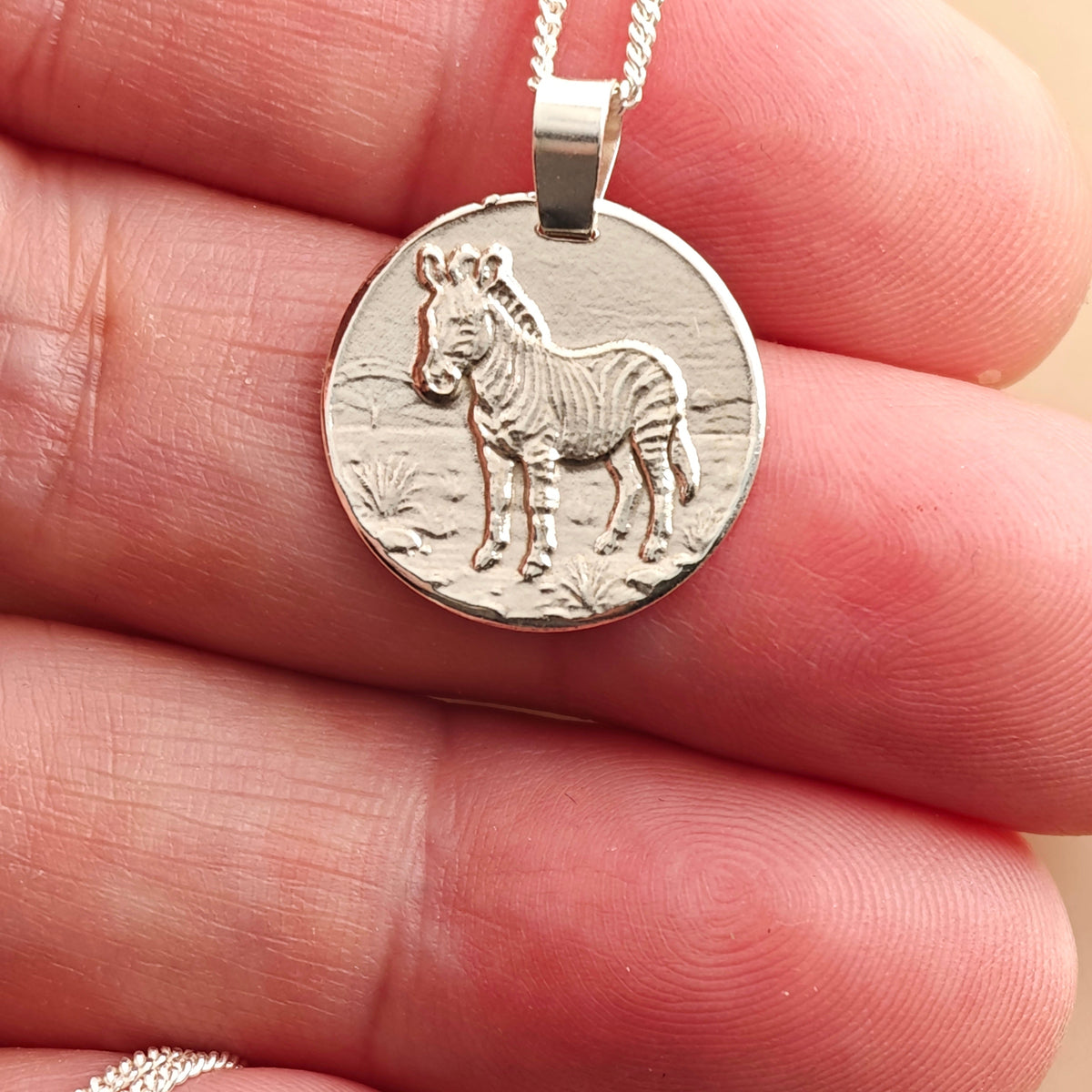 Zebra Coin Necklace – Deep Engraved Recycled Sterling Silver
