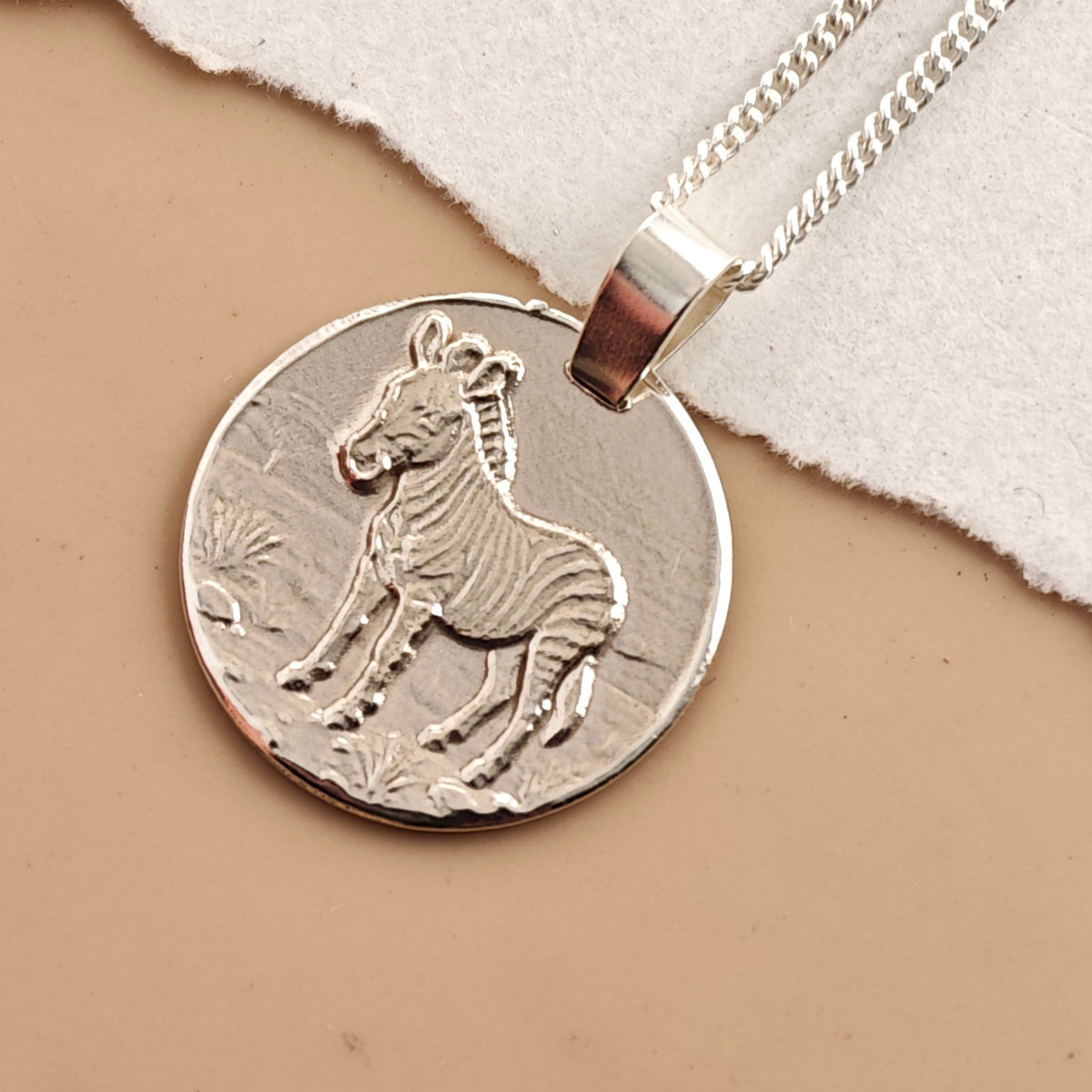 Zebra Coin Necklace – Deep Engraved Recycled Sterling Silver
