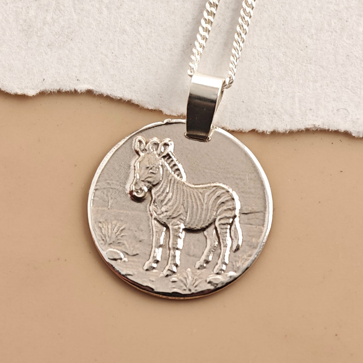 Zebra Coin Necklace – Deep Engraved Recycled Sterling Silver