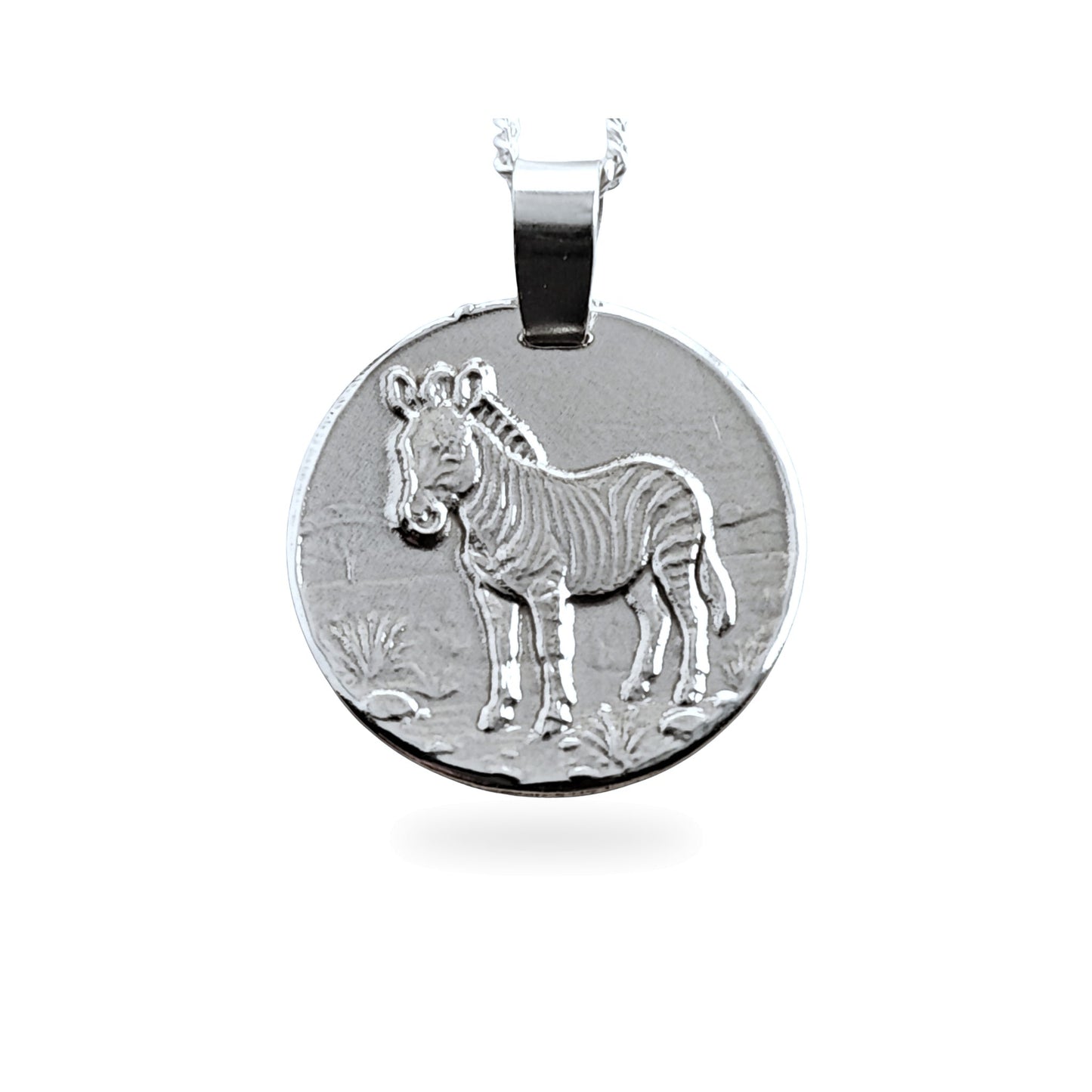Sterling silver engraved zebra coin pendant necklace, handcrafted in the UK from recycled sterling silver