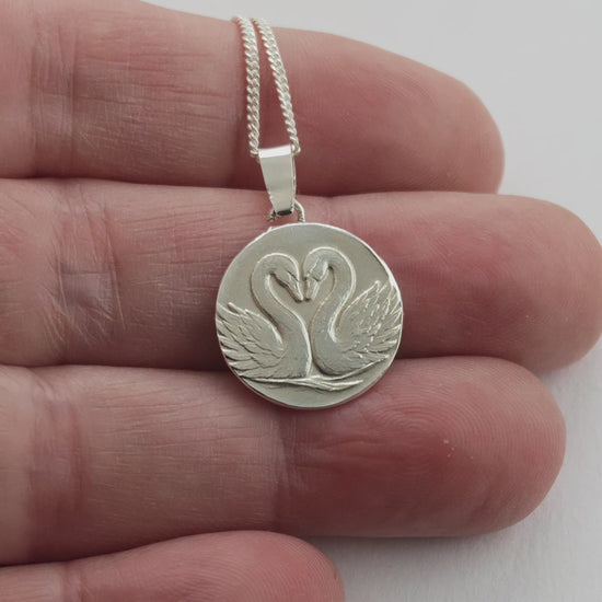 Gemini Sterling Silver Necklace Zodiac Twin Swans Disc Pendant on hand moving