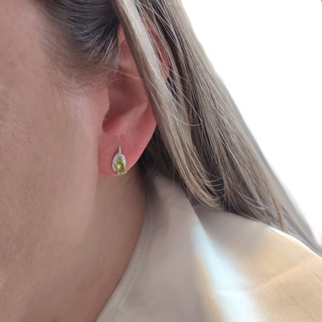Peridot and tiny diamond stud earrings model