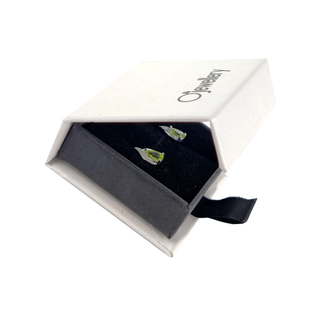 Peridot and tiny diamond stud earrings boxed