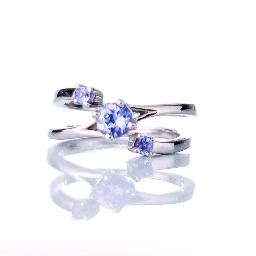 sterling silver tanzanite ring size i-s adjustable blue december birthday designed in the UK
