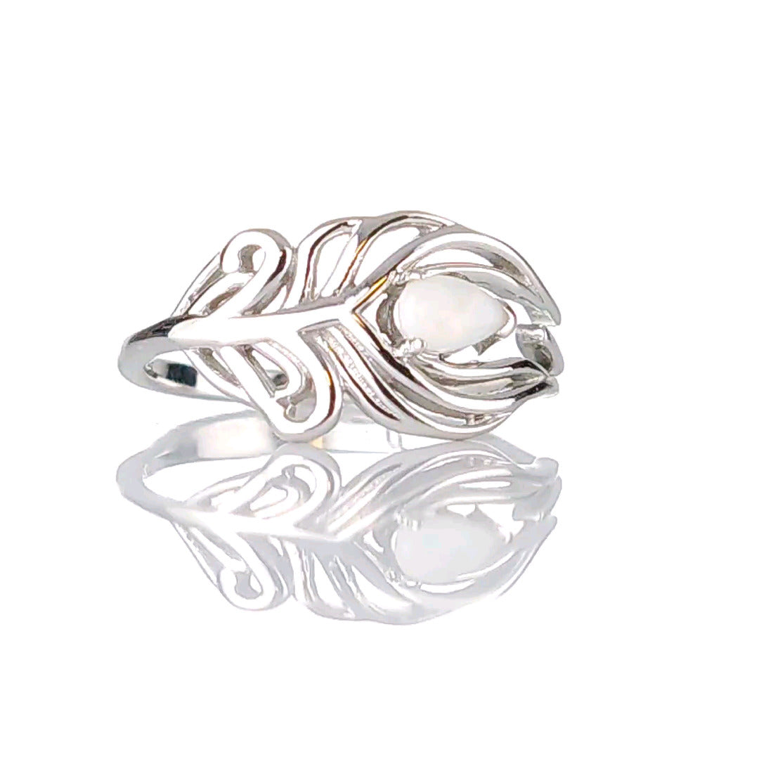 peacock feather opal ring designed in the UK