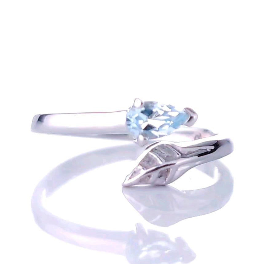 sterling silver topaz leaf ring size i-t adjustable blue december birthstone designed in the UK