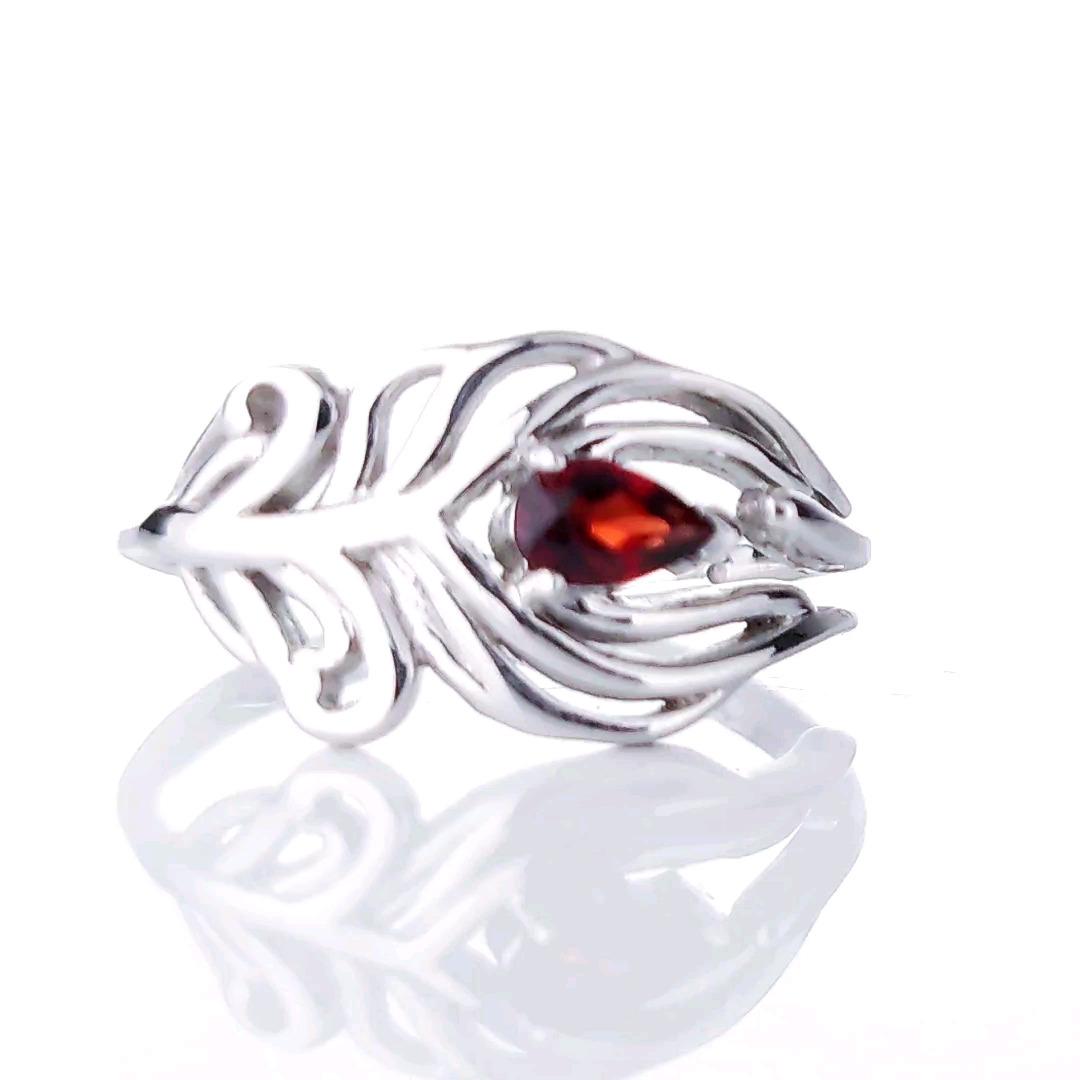garnet peacock feather adjustable ring sterling silver size j-t designed in the UK