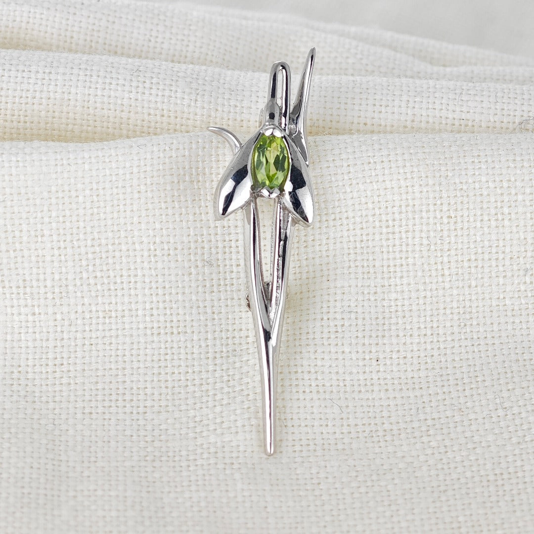 Peridot Snowdrop Brooch Sterling Silver resting on cotton 