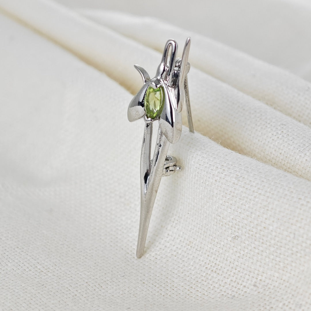 Peridot Snowdrop Brooch Sterling Silver on cotton
