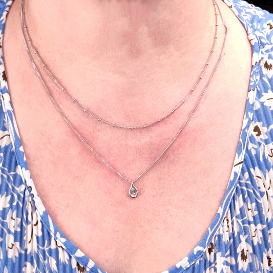 Aquamarine rubover pear pendant plus layered bead chain sterling silver model